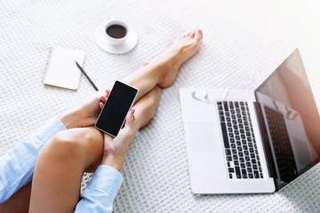 Young woman using smart phone