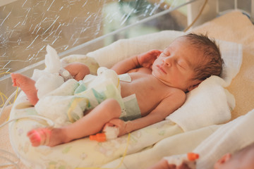 sleeping newborn baby in hospital