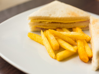 sandwich ham cheese and french fries