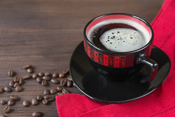 Black and red cup of coffee