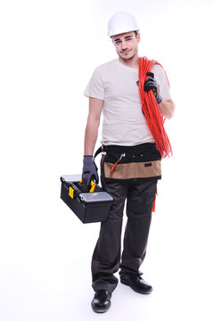 handsome young construction worker isolated on a white background