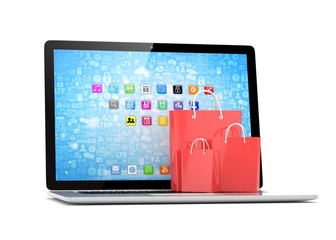 laptop and  shopping pags on white background. 3d rendering.