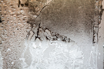 Ice flowers on glass - texture and background