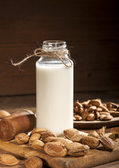 Obraz na płótnie Canvas Almond milk with almond