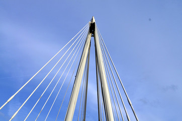Modern bridge cables blue sky