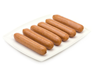 Raw Hotdogs on a Plate