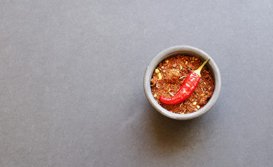 bowl with spices and hot pepper, selective focus
