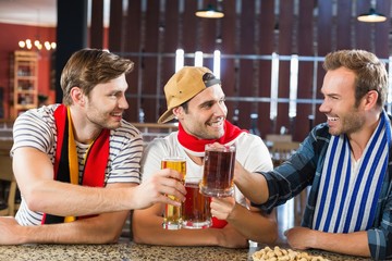 Men toasting with beers