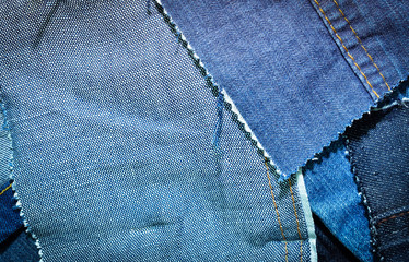 Texture of blue jeans textile close up