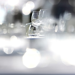 wine glasses/ wines glasses on a set table