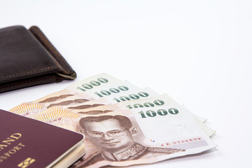 Thailand passport and Thai maney And old wallet.