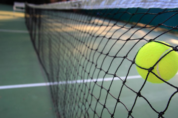 Tennis ball in net
