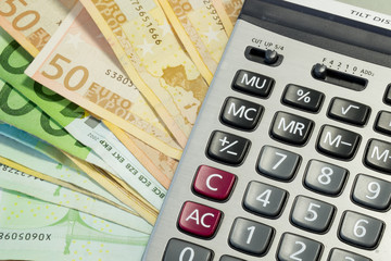 Euro money bills and calculator