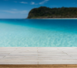 Wood table top or flooring on the beach background