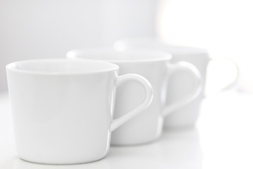 three tea cups