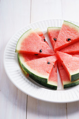 Watermelon. Slices of fresh watermelon on white