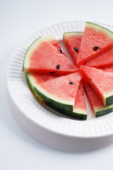 Watermelon. Slices of fresh watermelon on white