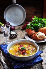 Vegetable soup with smoked sausage. Rustic style.