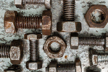 Many screws on zinc background