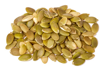 heap of green peeled pumpkin seeds