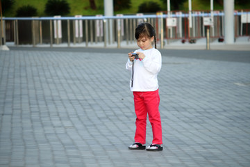 asian baby girl with camera