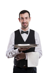 Waiter holding tray. Isolated over white background. Smiling but