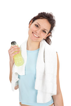 young beautiful woman with bottle after fitness isolated on white