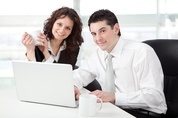beatiful business couple with businessman and businesswoman at office