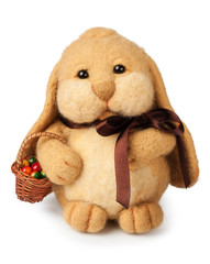 Bunny with easter eggs in basket isolated on white background