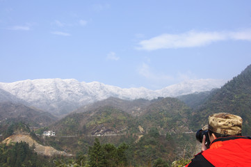 Fototapeta na wymiar The snow mountains scenery in winter 