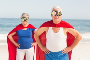 Senior couple wearing superman costume