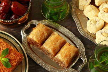 Baklava, turkish traditional delight with fresh mint and figs.