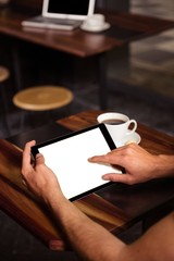 Hipster man using tablet 