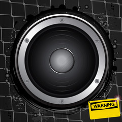 Loudspeaker on grunge background with warning sign