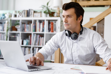 Young businessman in office