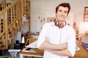 Portrait of young man wearing casual in office