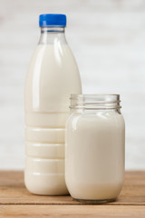 Milk bottle on wooden table