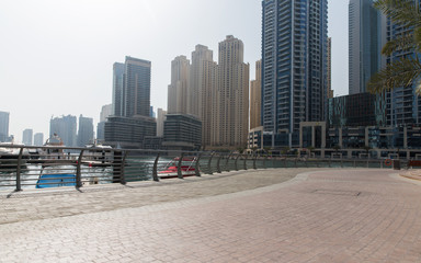 Fototapeta premium Dubai city seafront or harbor with boats