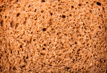 slice of black bread as background