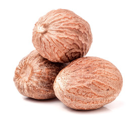Three nutmeg whole  isolated on white background