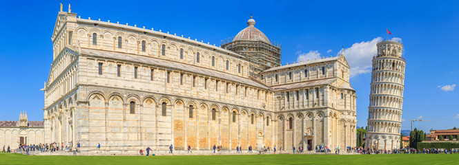 Leaning Tower of Pisa is the campanile, or freestanding bell tower, of the cathedral of the Italian city of Pisa, known worldwide for its unintended tilt. - obrazy, fototapety, plakaty