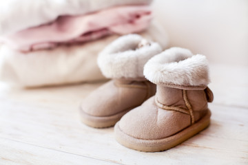 small pair  baby  ugg on white background