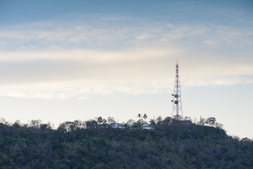 Telecommunication tower on mountain at twilight time