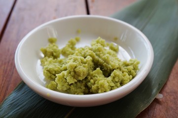 Dish of grated wasabi radish, a green Japanese condiment