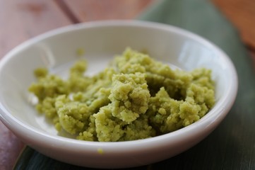 Dish of grated wasabi radish, a green Japanese condiment