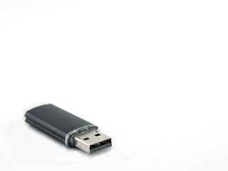 Black UBS flash drive isolate on white background with space for text.