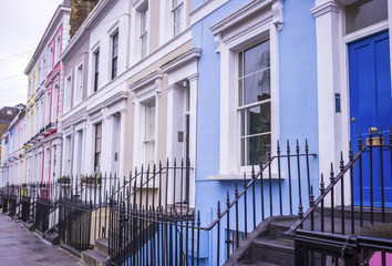 Traditional colourful houses at Notting Hill district near Portobello road - London, UK