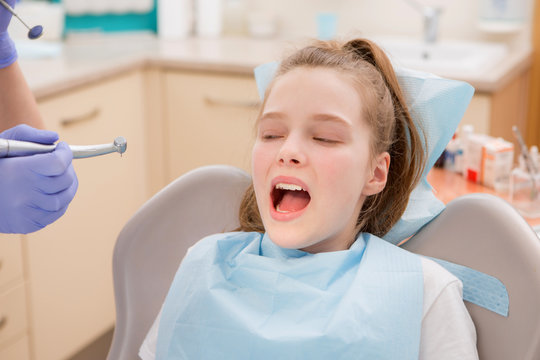 Young girl at dentist., dental treatment

