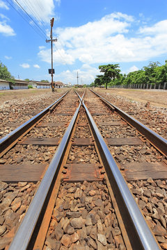 Railway crossroad under blue sky