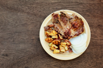 pork steak potato in village white onion